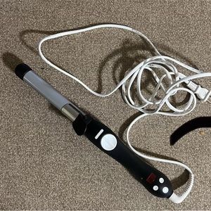 Beachwaver curling iron.